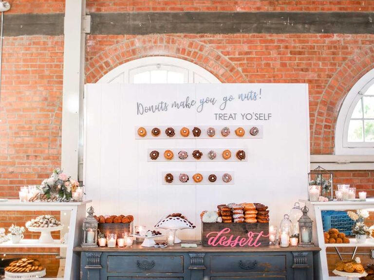 Large donut wall with dessert spread