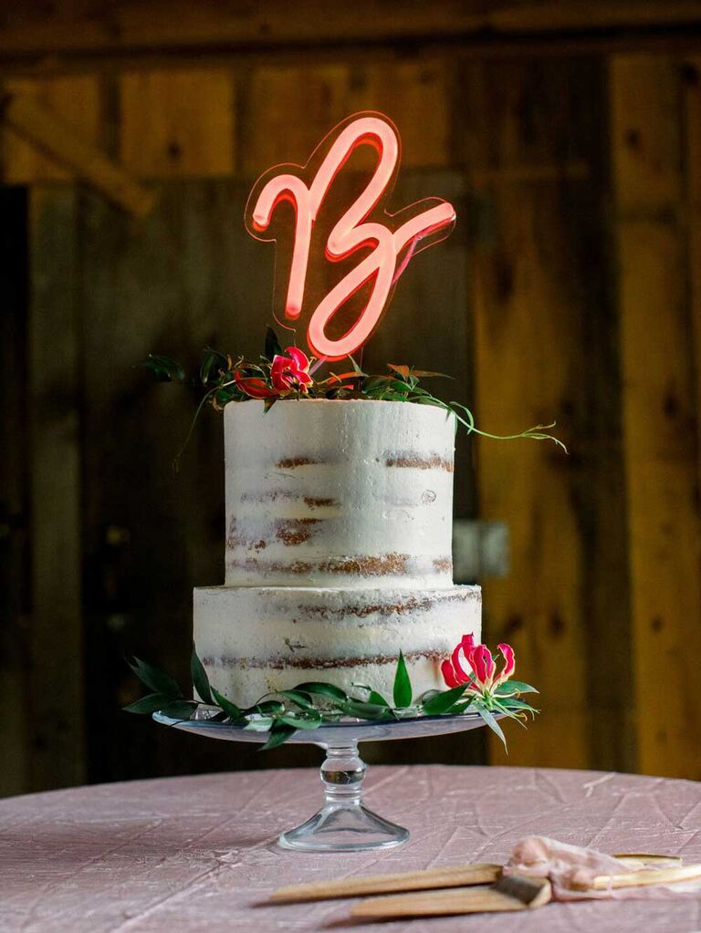 Small wedding cake with neon light up cake topper