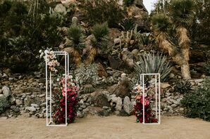 Desert Ceremony with Cacti, Stones and Red Flower Pillars