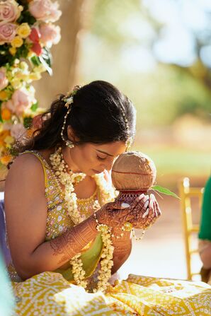 Indian Bride Bowing Her Head During Her Haldi, Traditional Turmeric Ceremony