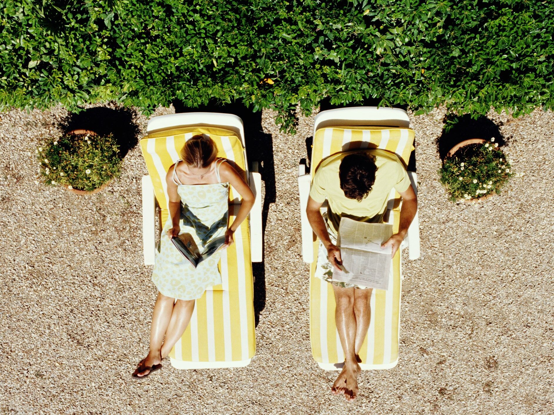 Couple reading on their honeymoon. 