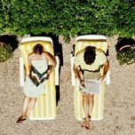 Couple reading on their honeymoon. 