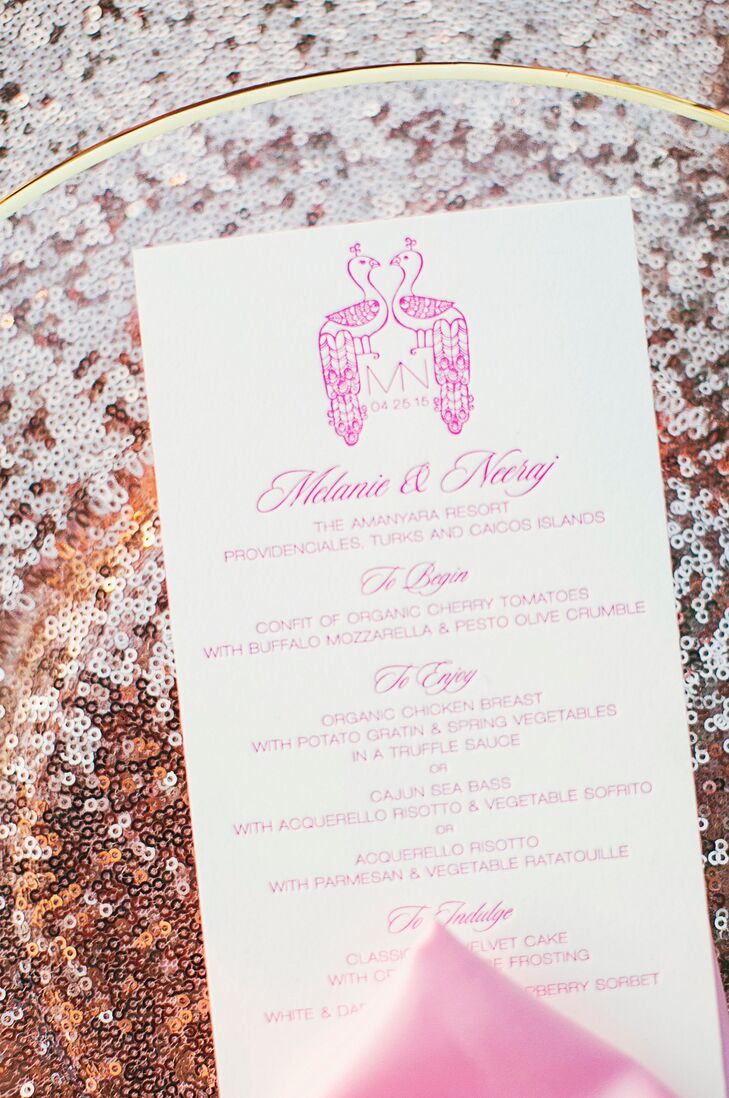 The couple's custom peacock monogram was printed in pink letterpress at the top of their menu cards. The peacock holds special meaning in Hindu culture, representing kindness and luck.