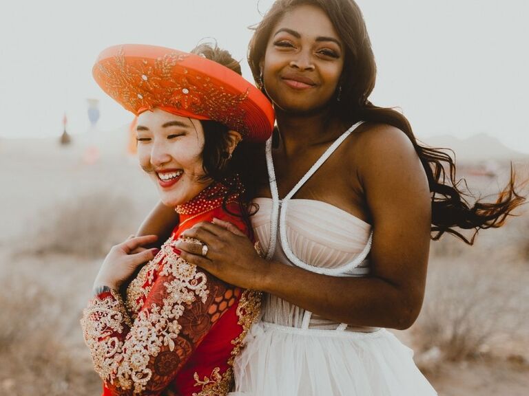 brides posing for wedding portraits in the dessert