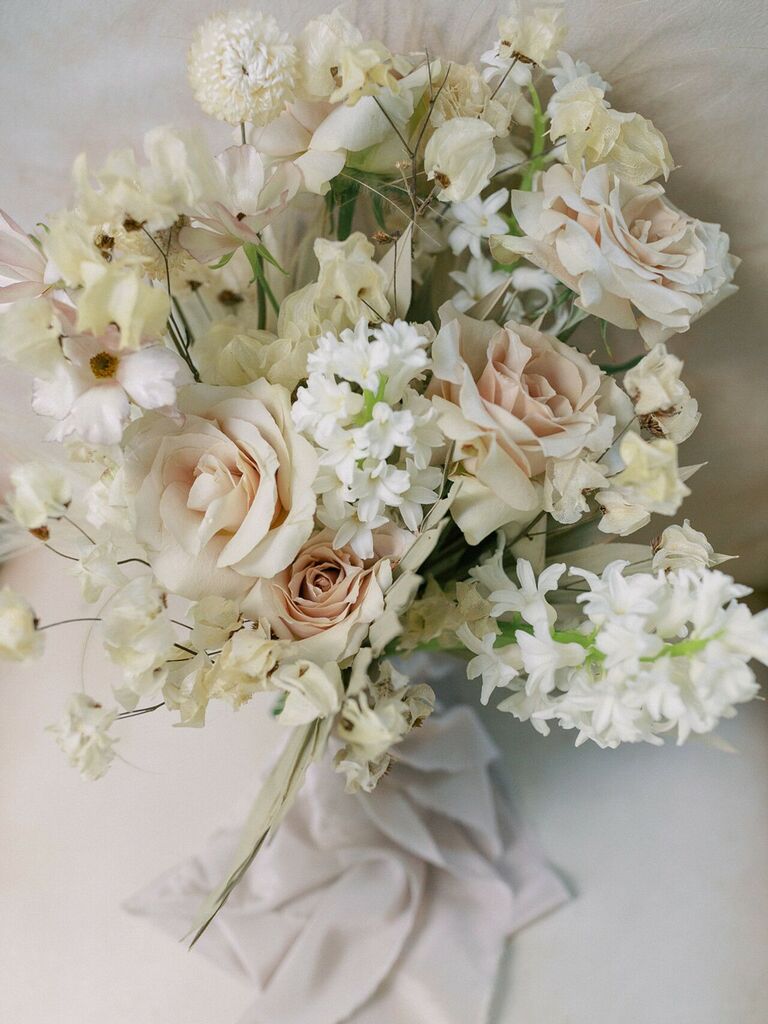 Neutral wedding bouquet with tan roses 