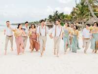 Grooms with wedding party at destination wedding