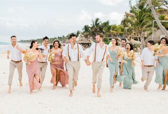 Grooms with wedding party at destination wedding
