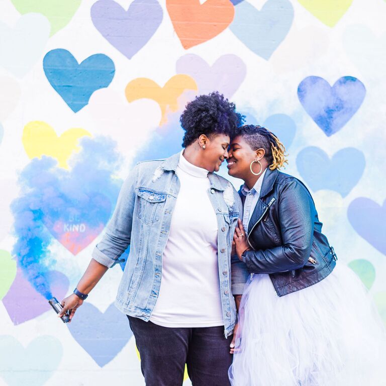 A Cheerful Engagement Shoot With a Colorful Smoke Bomb