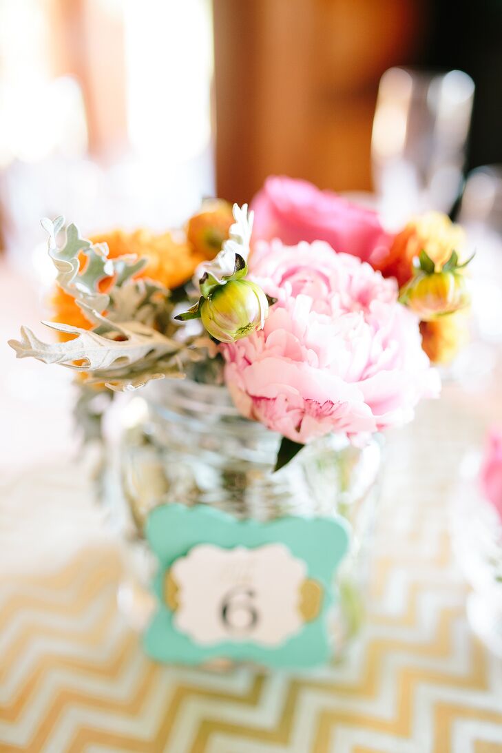 Brightly-Colored Peony Centerpieces with Turquoise Table Numbers