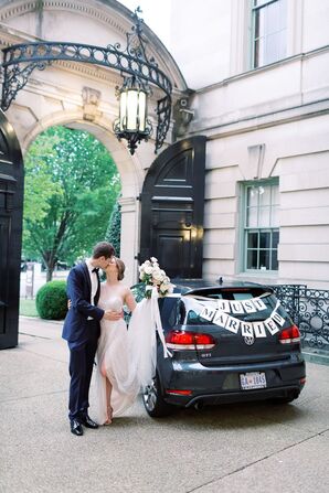 Couple With Just Married Car Decorations
