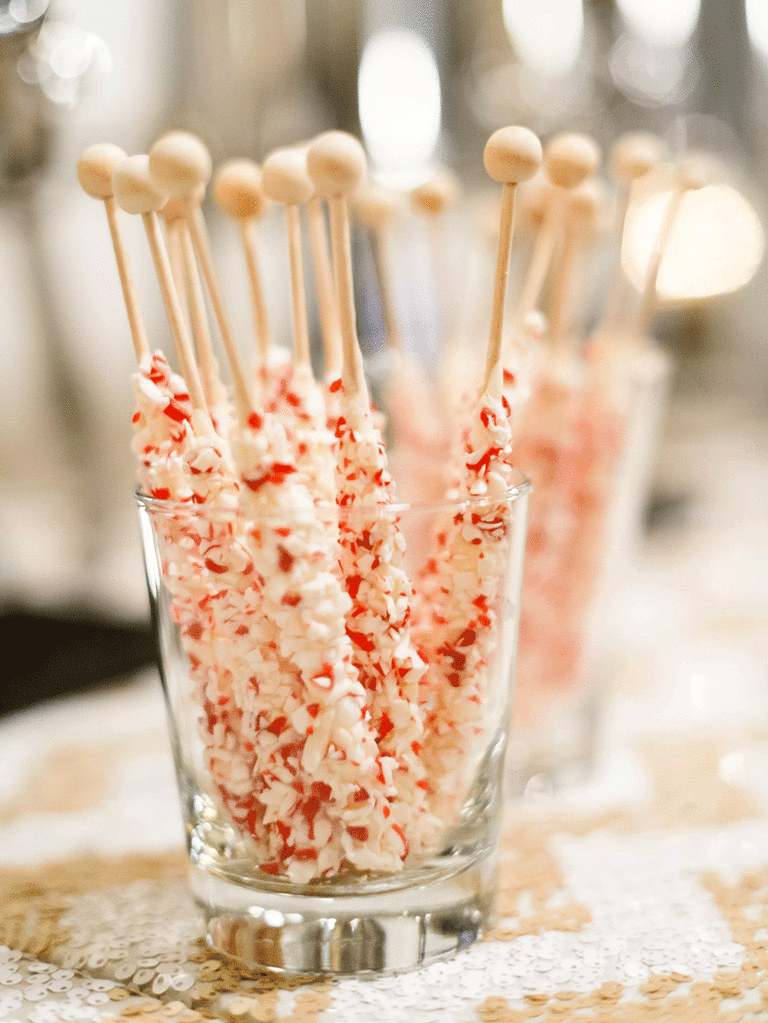Peppermint candy stirrers for a winter wonderland wedding food idea.
