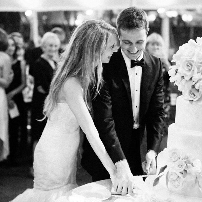 Erin and Taylor compromised on the flavor of the sugar-flower covered cake— half was carrot with cream cheese frosting (her favorite) and the other half was white cake with a hazelnut and raspberry filling (his pick).