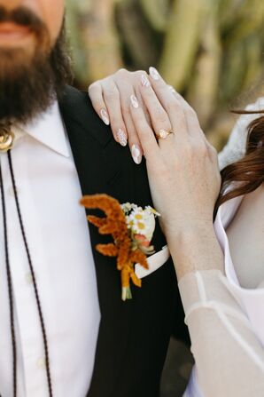 Colorful Burnt Orange Boutonniere and Bride's Unique, Light Nails, Engagement Ring