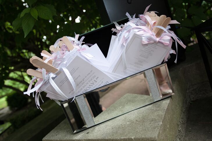 The couple chose a color palette of light gray, light pink and ivory to capture an elegant and romantic feeling. "These colors were brought out through every detail," says the bride.