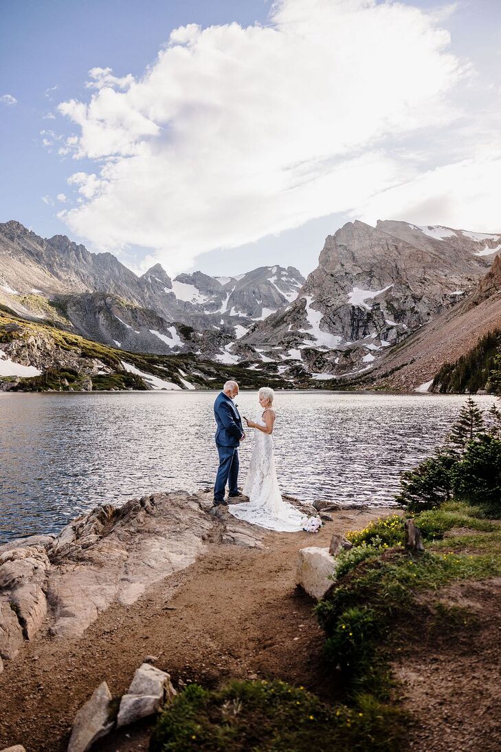 Bride and Groom Say Personal Vows at Rocky Mountain Elopement by a Lake