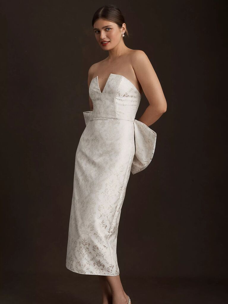 white cocktail engagement dress with statement bow 