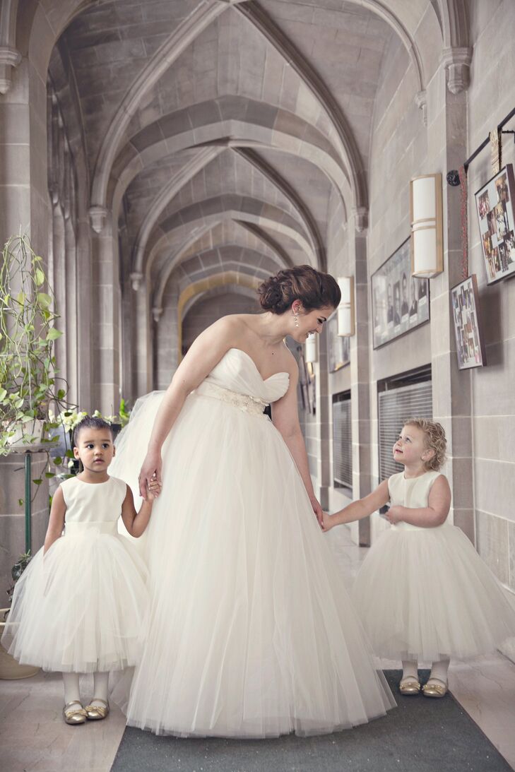 Emily's mother hand-stitched the flower girl dresses, designing each to look like the bride's ivory tulle ball gown.