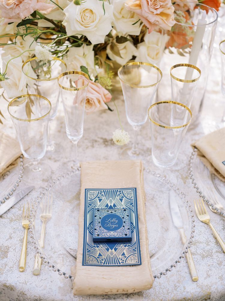 art deco black-and-gold wedding place setting