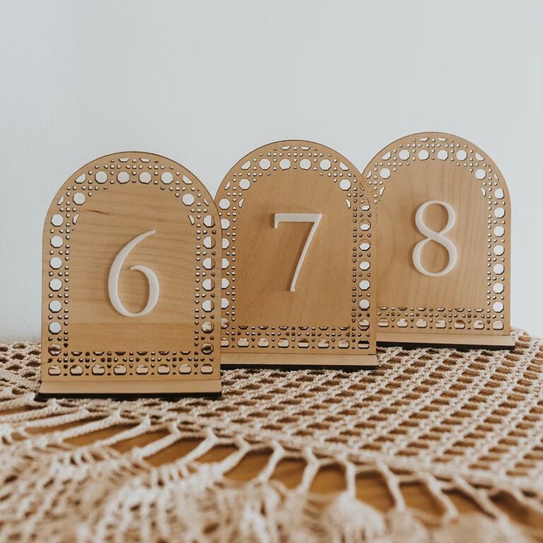 boho wedding table number idea wooden arch sign with cutout detail
