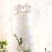 Simple White Wedding Cake With Greenery Cascade