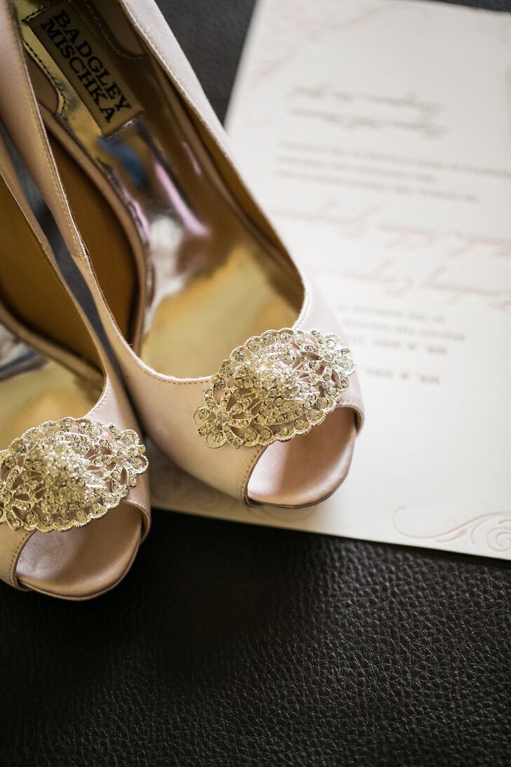 Lindsay wore a pair of satin blush peep-toe Badgley Mischka heels with sparkly broaches on the tops.