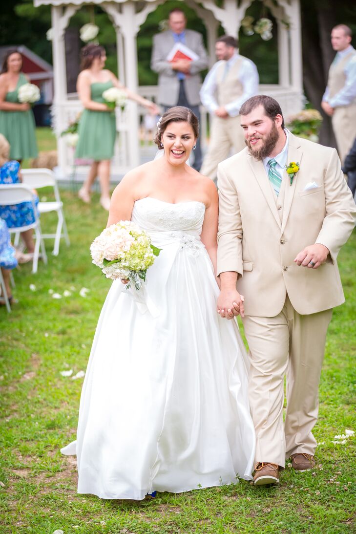 Emily wore a strapless taffeta gown with a corset. "I loved the beading, lace and ruching across the flattering waistline," she says.