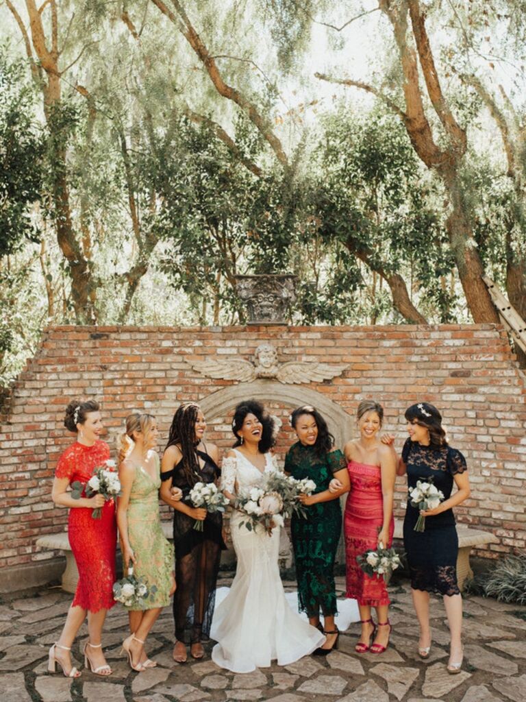 bride with bridesmaids in mismatched dresses