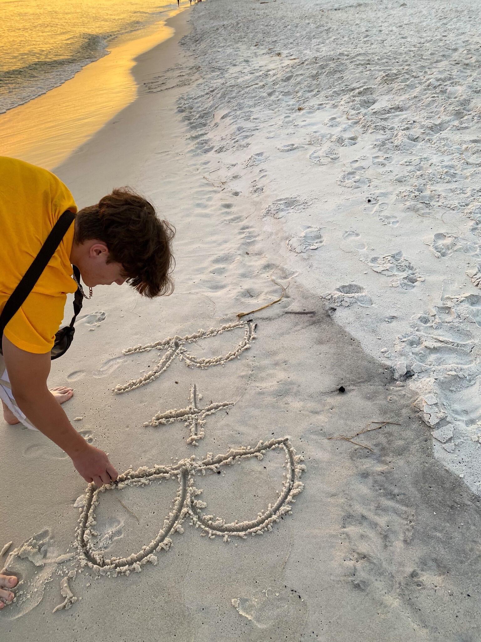 Ben carved our names in the sand. He’s always done the sweetest things.