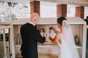 Glamorous Couple Pouring Beer on Tap