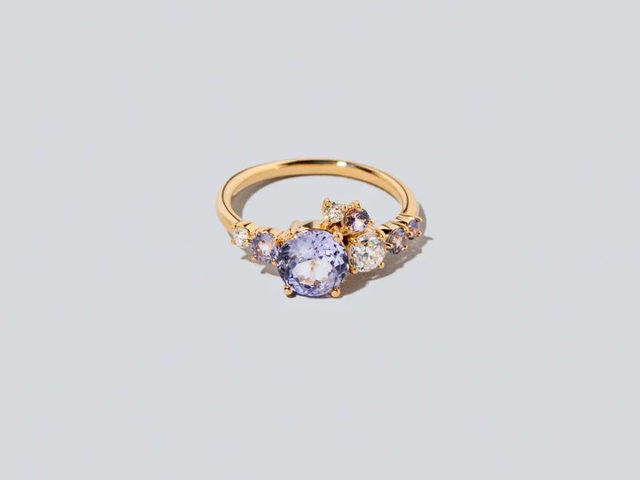 A clustered sapphire gold band.