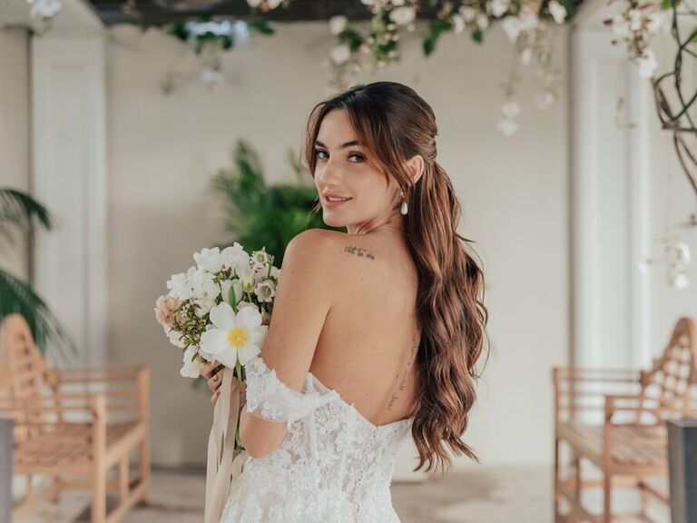 Bride wears her hair long and natural for her Vegas wedding. 