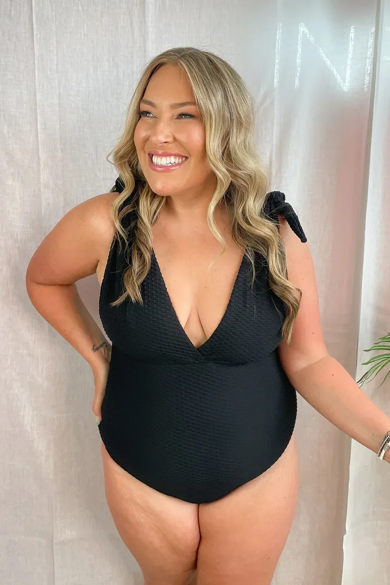 textured one piece with plunging neckline and tie straps