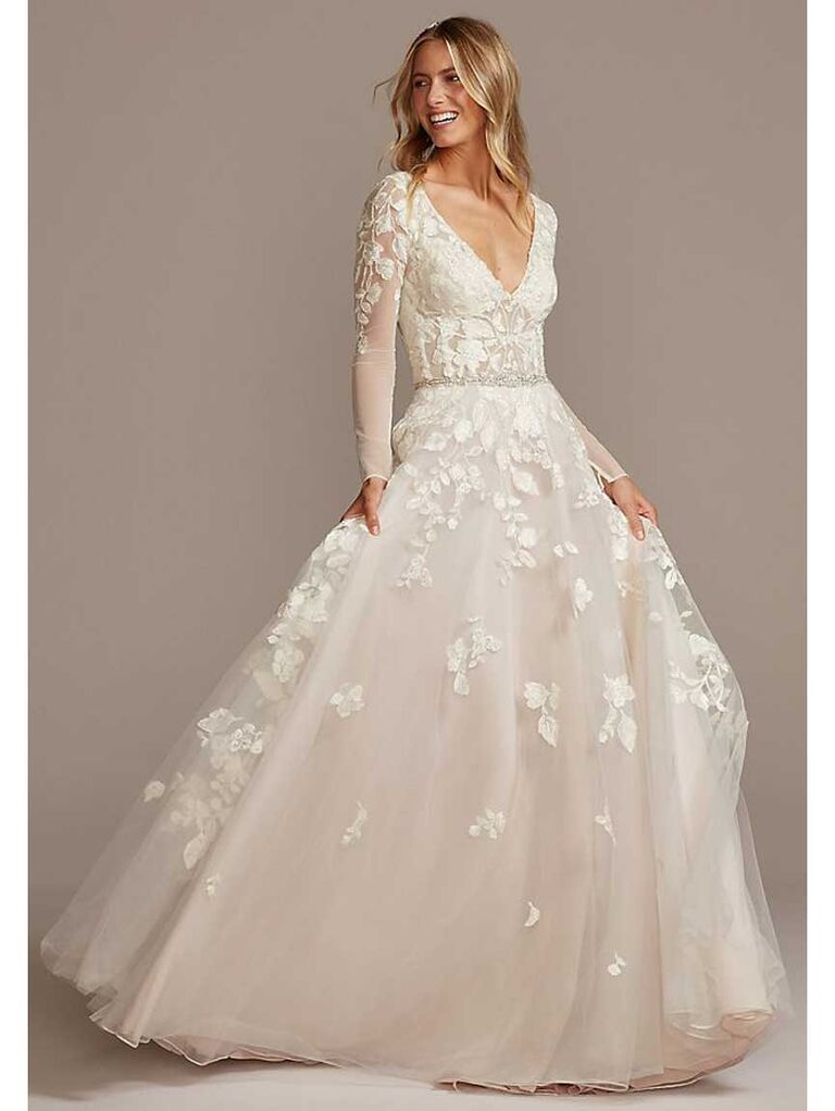 Illusion sleeve plunging ball gown wedding dress