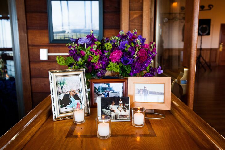 Guests paused at a table filled with old family photos at the entrance to the reception area.