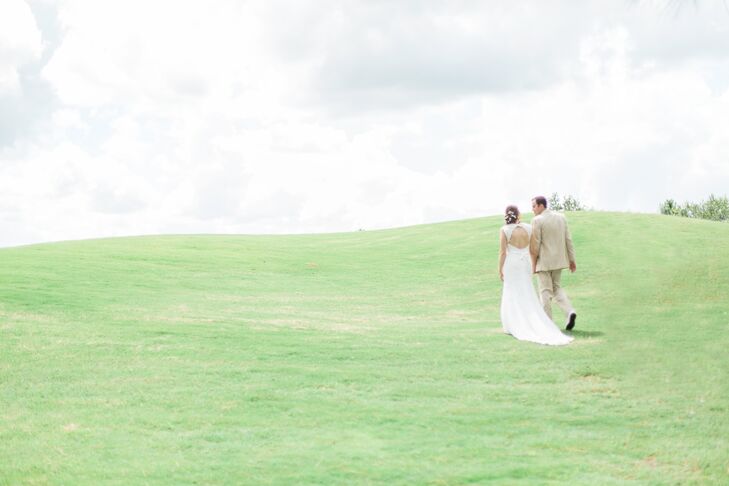 Cami and Tarik wanted a “classic, vintage” feel to the wedding, but that doesn’t mean she couldn’t have a little fun with her dress. The dress was covered in lace appliques and accented with a large keyhole back.