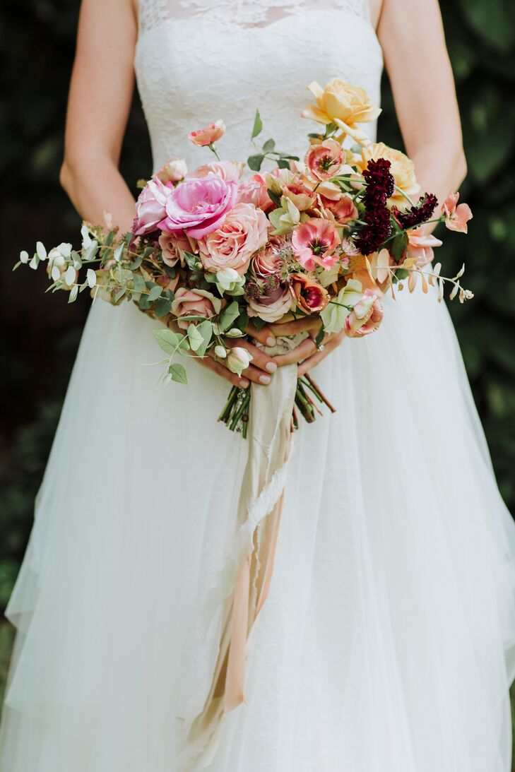 A Vintage, Whimsical Bouquet Wrapped in Lace and Ribbon