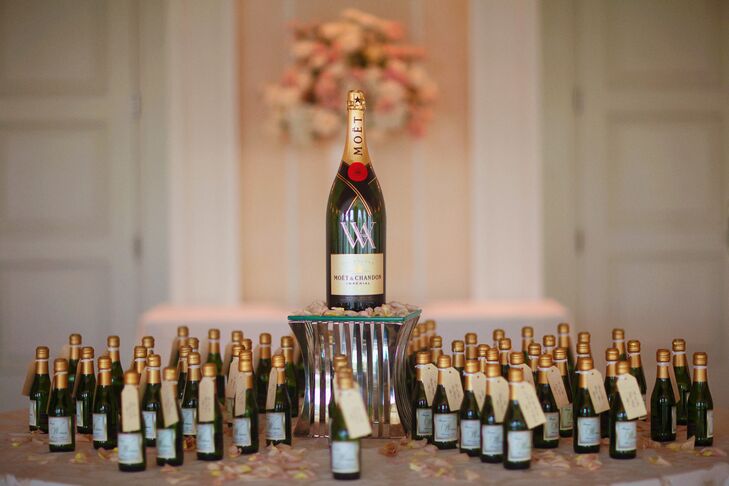 Guests went home with custom-labeled miniature bottles of pink champagne. They were displayed on a table outside the Grand Ballroom around a magnum champagne bottle with a crystal “W” on it.