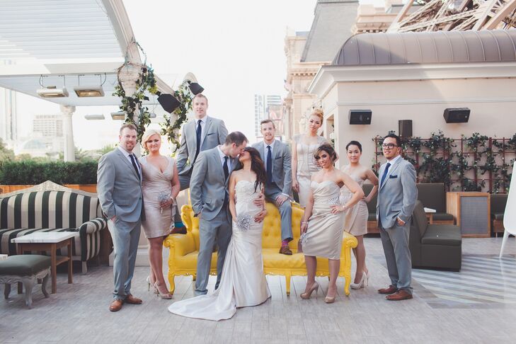 The bridesmaids all wore knee length champagne colored dresses in varying styles and the groomsmen all matched the groom in wearing the same gray suits, pocket squares and ties.