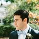 Jonathan and his groomsmen wore navy suits with custom bow ties from Jonathan's company, Brier and Moss. For some southern flair, they wore boutonnieres consisting of cotton bolls and greens.