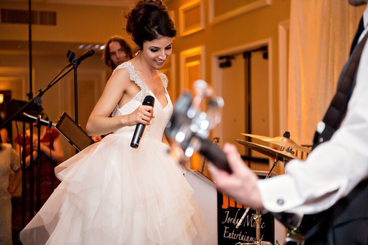 Lauren and Phil are musicians, so great music was high on their priority list. In addition to hiring a live band to send the soiree into high gear and keep the dance floor packed, they decided to surprise guests with a performance of their own toward the end of the night.