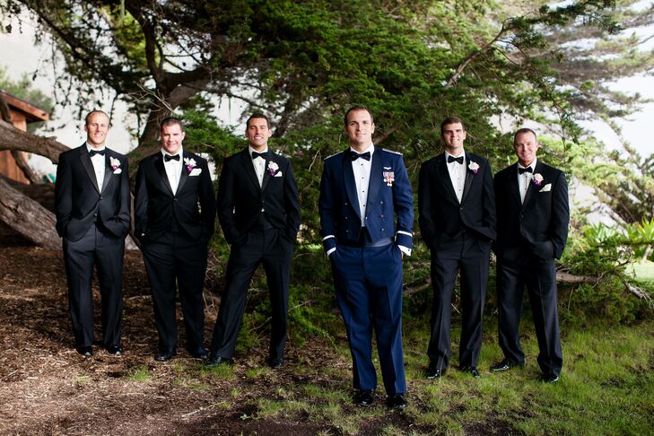 Jeff's groomsmen wore traditional black tuxedos with matching black bow-ties.