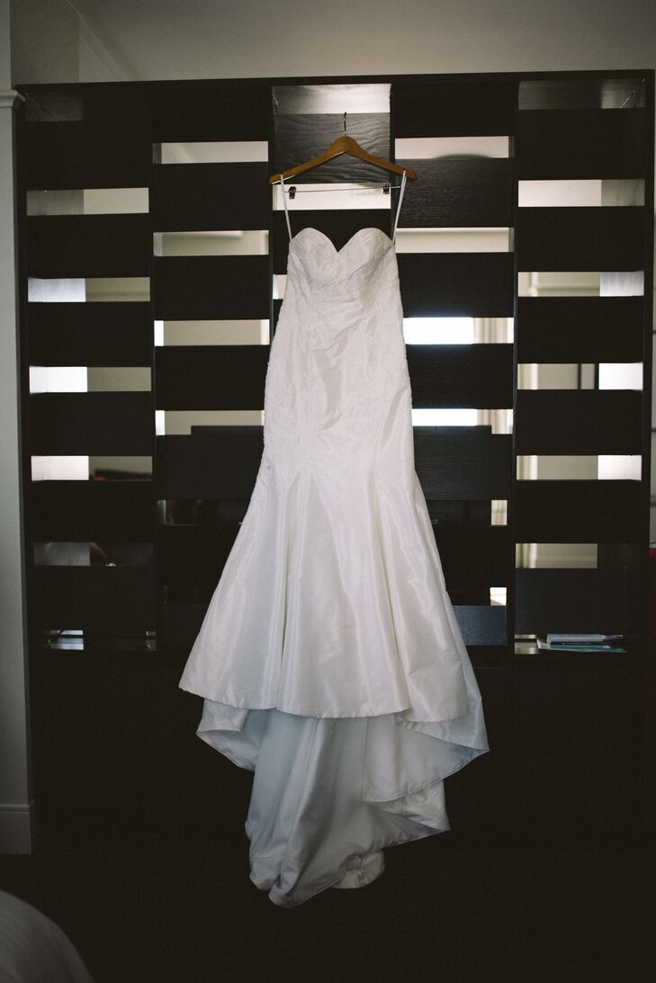 From Allure Bridals, Elisa's wedding gown was simple, yet elegant with a sweetheart neckline.