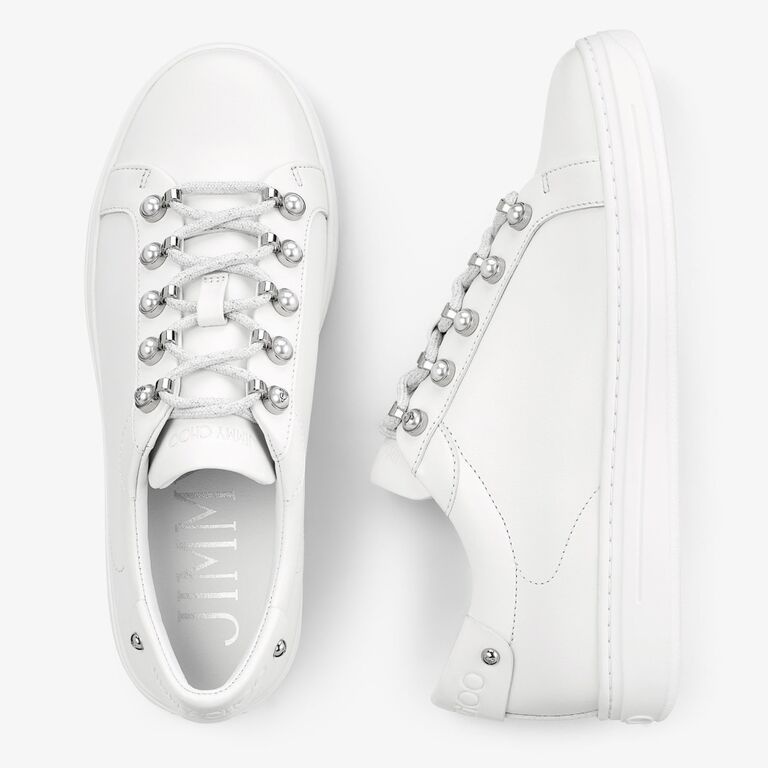 White Jimmy Choo sneakers with pearls lining the laces