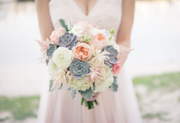 “One flower I fell in love with early on was peach-colored astilbe, which established peach and blush as colors,” Lindsey says. Her bouquet from Libby's Flowers was filled with white and pink astilbe, blush garden roses, white hydrangeas, white ranunculus, pink roses, dusty miller and succulents for some extra texture.