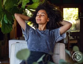 Woman practicing stress relief techniques