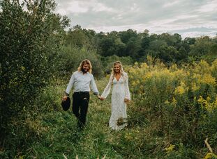 Natalie and Greg took rustic to new heights on their wedding day. “We wanted a backyard-style forest ceremony but with a twist,” Natalie says. “We’re 