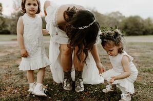 Flower Girls with White Dresses and Floral Hair Accessories