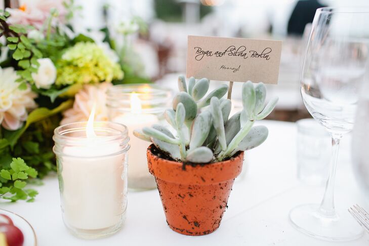 Silvia potted the succulents herself and made the escort cards as well.