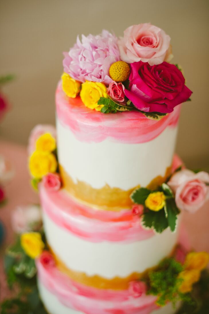 As an avid baker, Lauren knew what she wanted in a cake: moist and flavorful. That's what she and Brian got with their three-tier cake created by Short North Piece of Cake, filled with almond cake and covered with marshmallow fondant.