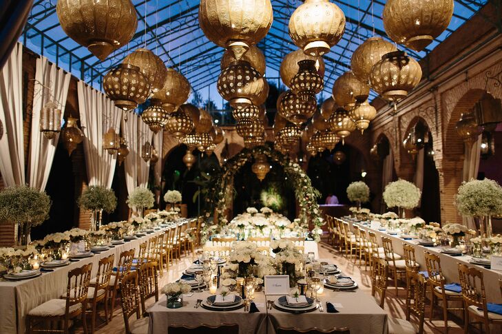 Inspired by the beauty and culture of their locale, Lauren and Jacques teamed up with Boutique Souk to pull off a whimsical alfresco fete with undeniable Moroccan flair. The reception took place in the outdoor courtyard. A canopy of lanterns and ivory votive candles set an intimate, romantic tone for the evening, while arrangements of baby’s breath, roses and olive branches lent a touch of rustic elegance to the space.